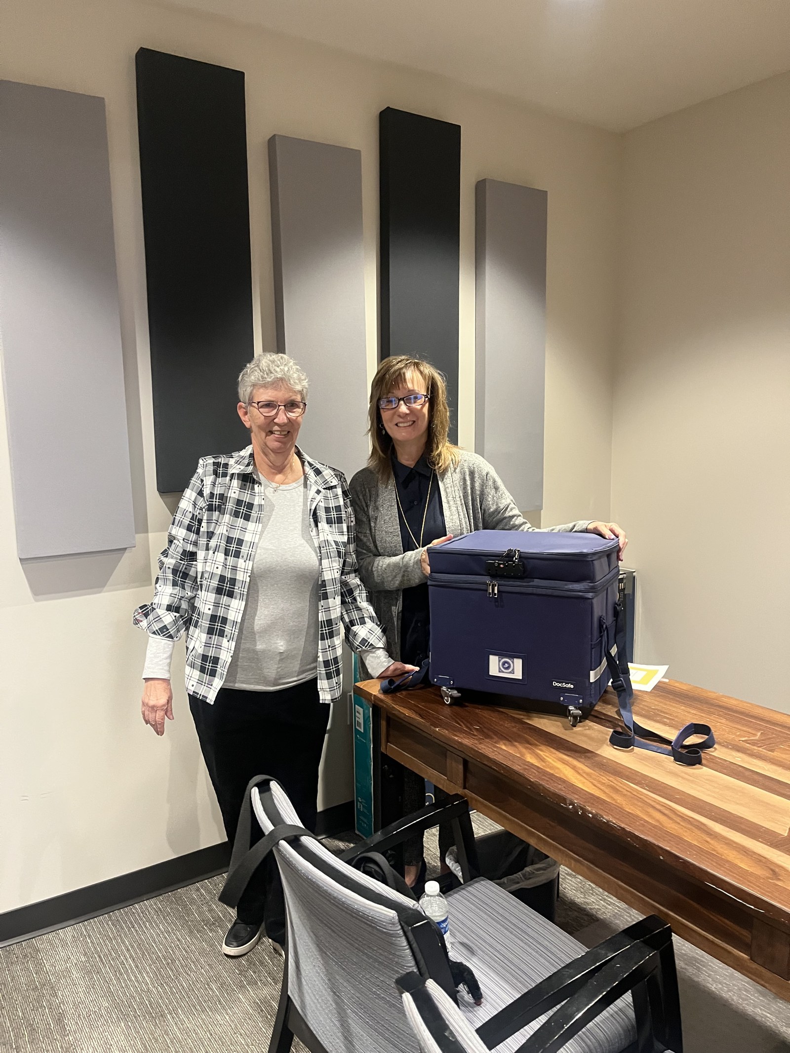 A couple bringing their completed Beneficiary Box home